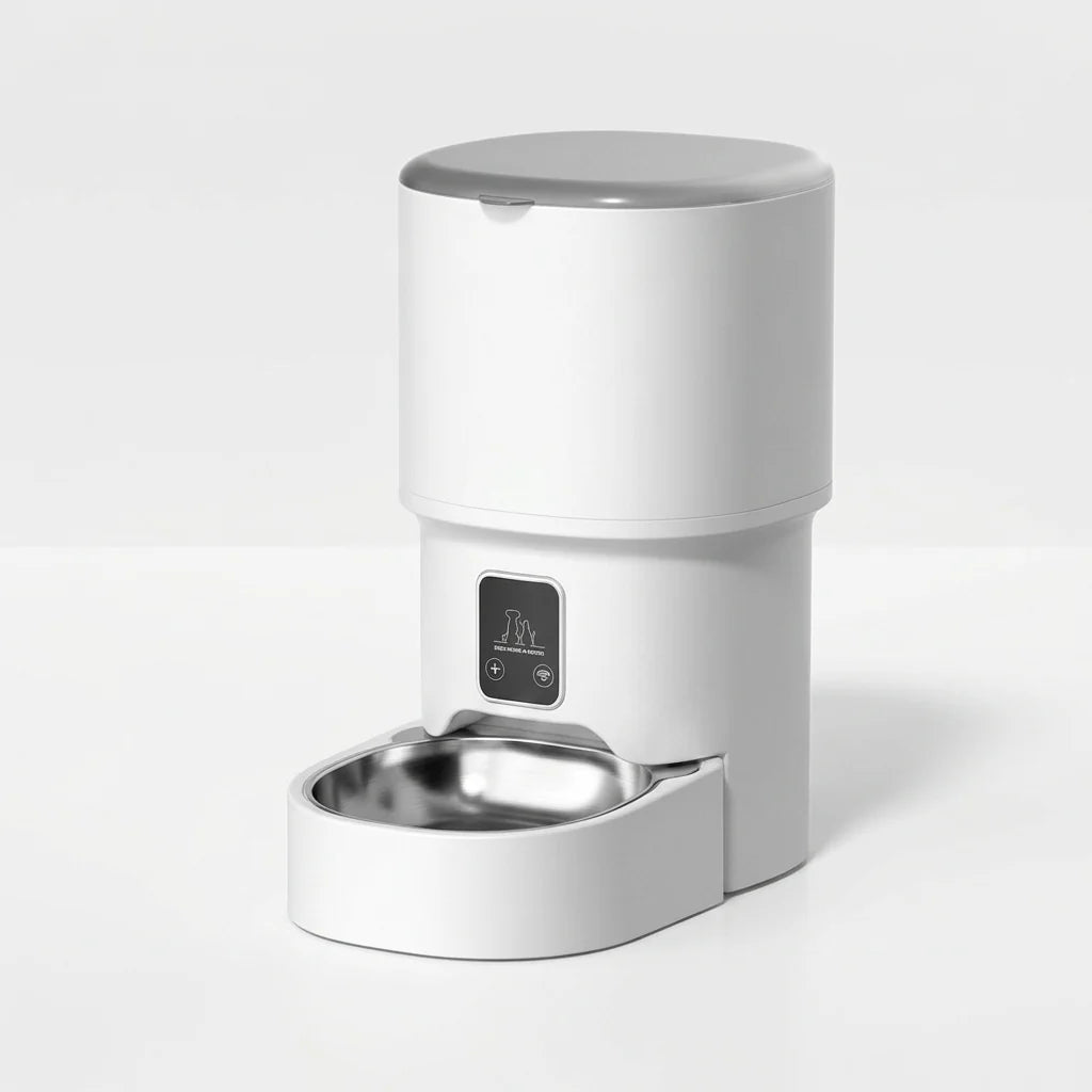 A white automatic pet feeder with a stainless steel bowl and a small digital display panel on the front.