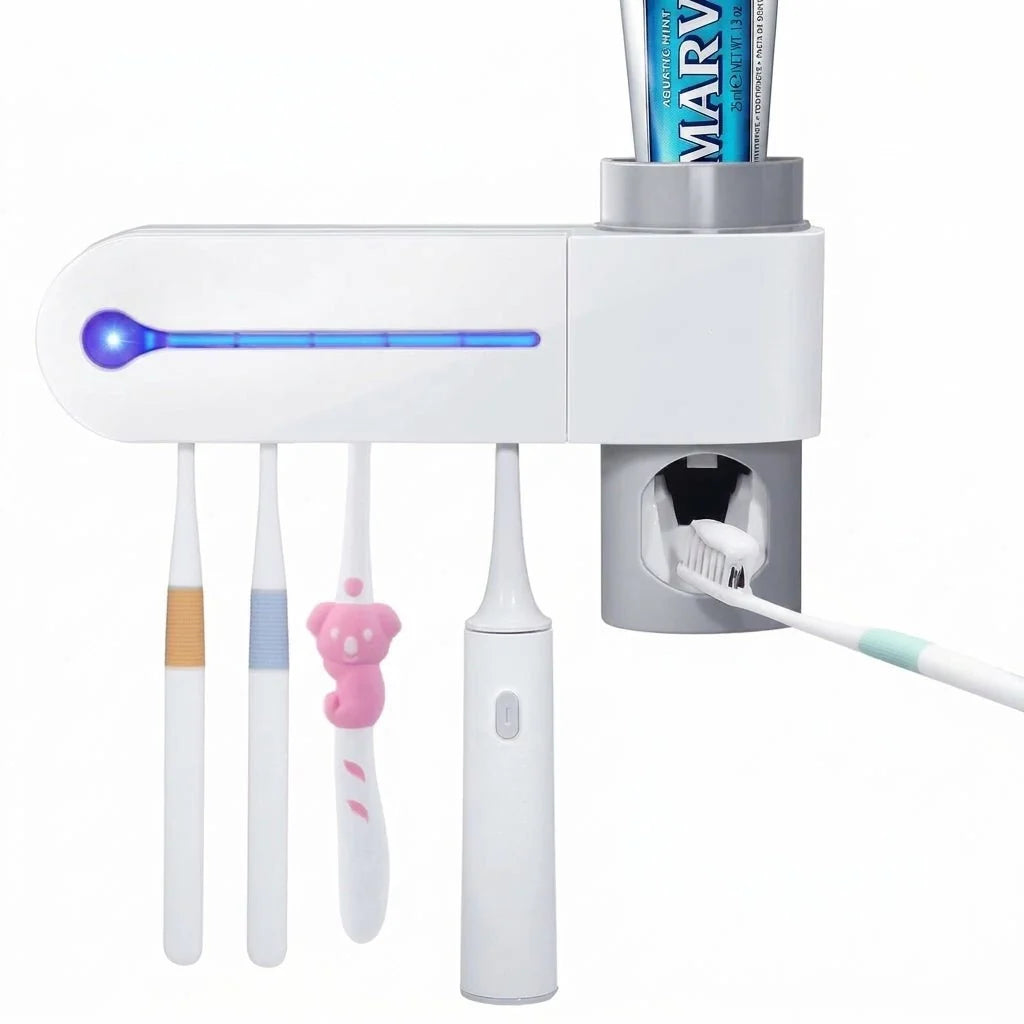 A wall-mounted UV toothbrush steriliser and automatic toothpaste dispenser holding four toothbrushes.