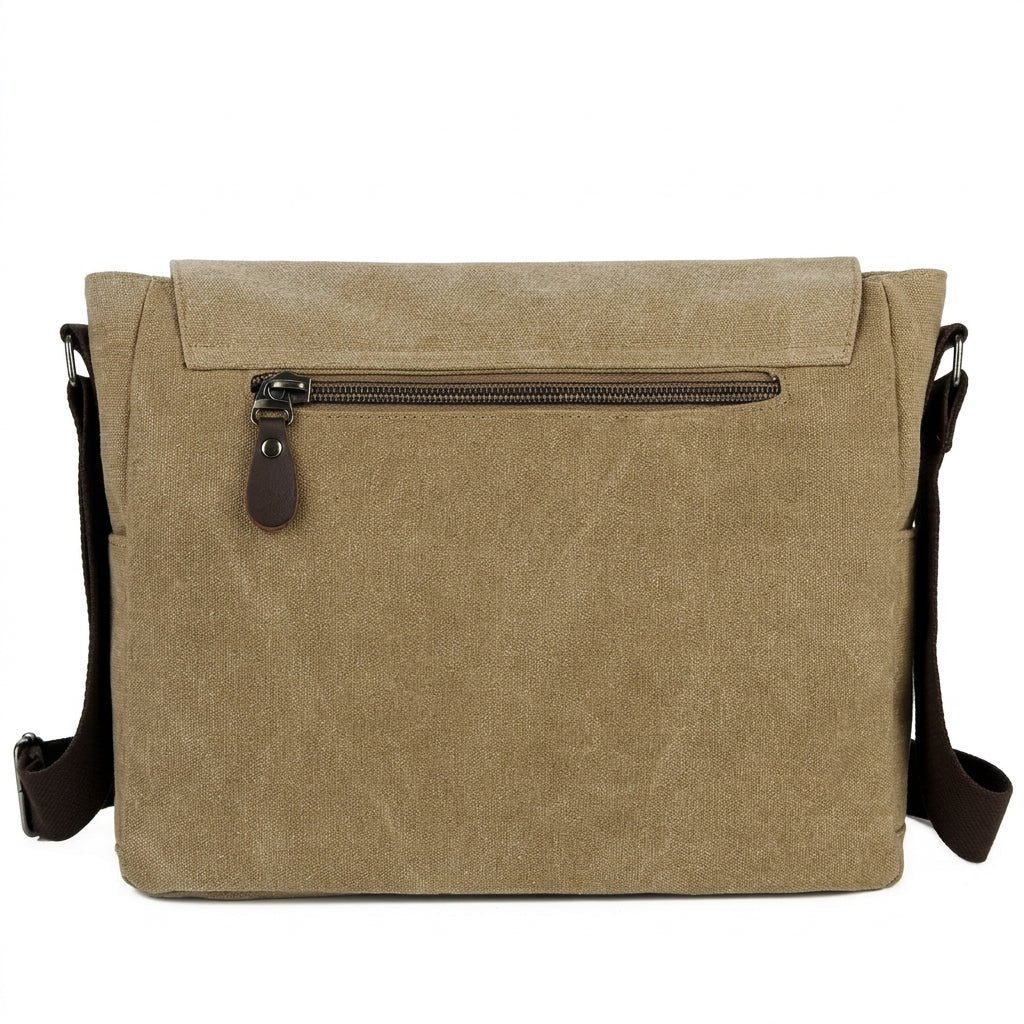 A tan canvas messenger bag shown from the back, featuring a horizontal zippered pocket and an adjustable brown strap.