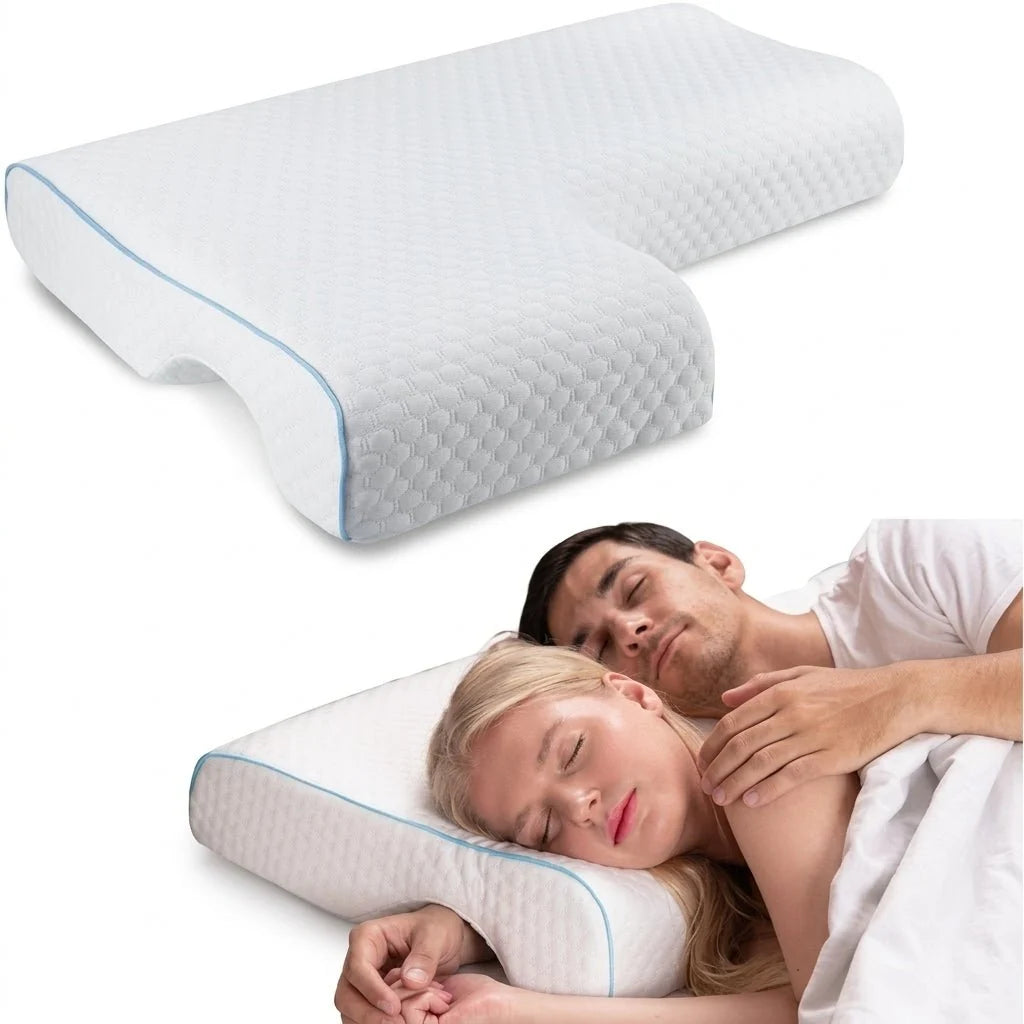 A couple sleeping comfortably on an ergonomic memory foam pillow with a unique tunnel design for shoulder support.