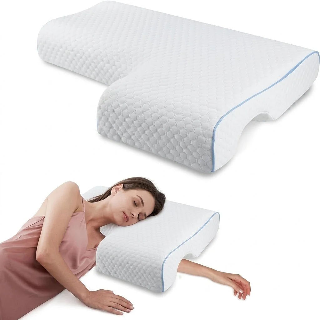A woman sleeping comfortably on a white, T-shaped orthopedic memory foam pillow designed with a tunnel for her arm.