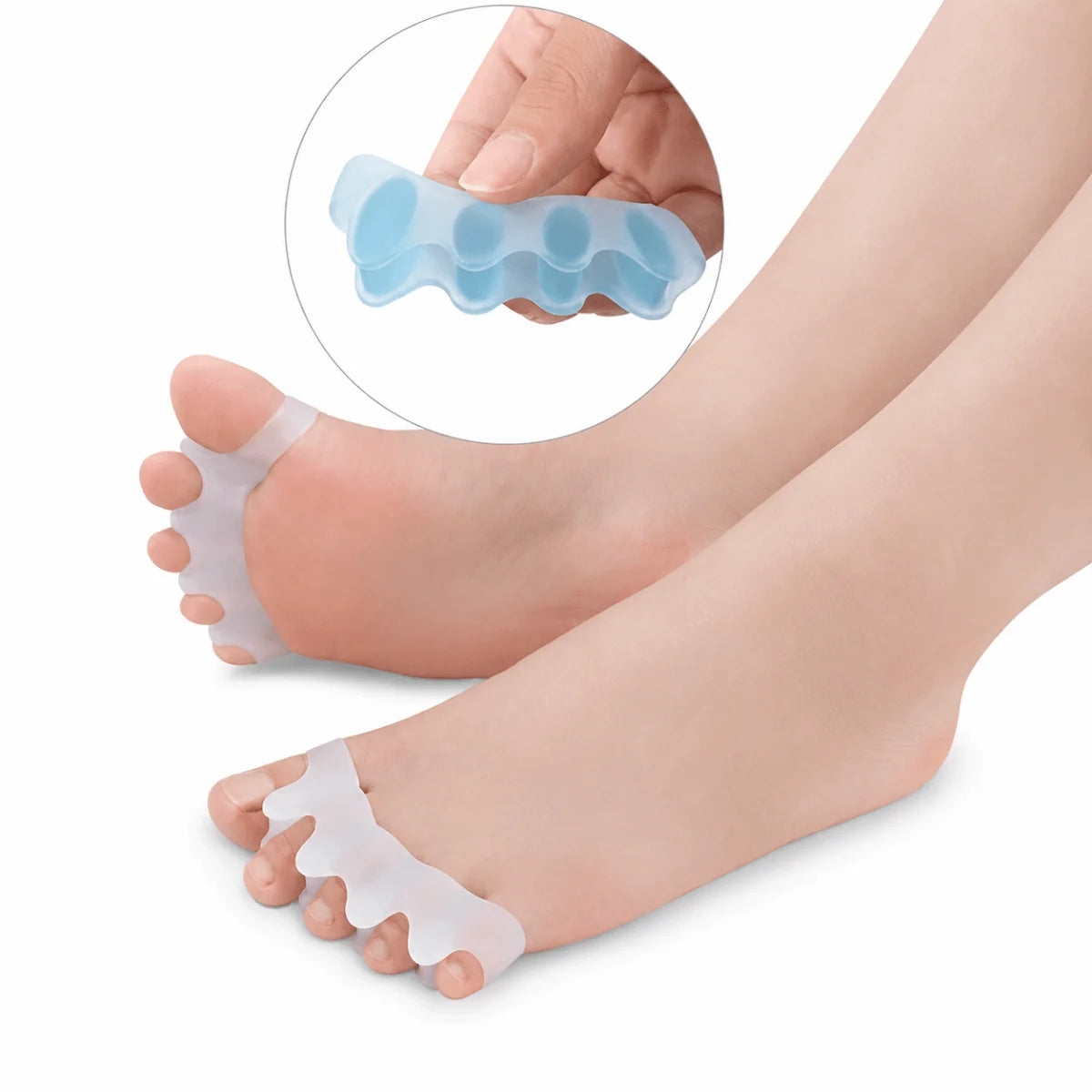 A person wearing soft silicone toe separators on both feet to help straighten toes and provide relief from bunions.