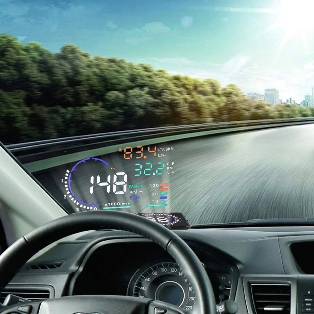 A car heads-up display projected onto the windscreen showing speed, engine RPM, and fuel consumption data while driving.