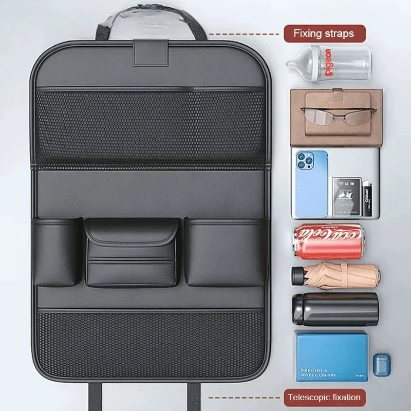 A black car seat organiser shown next to various items like a bottle, glasses, phone, drink, and umbrella.