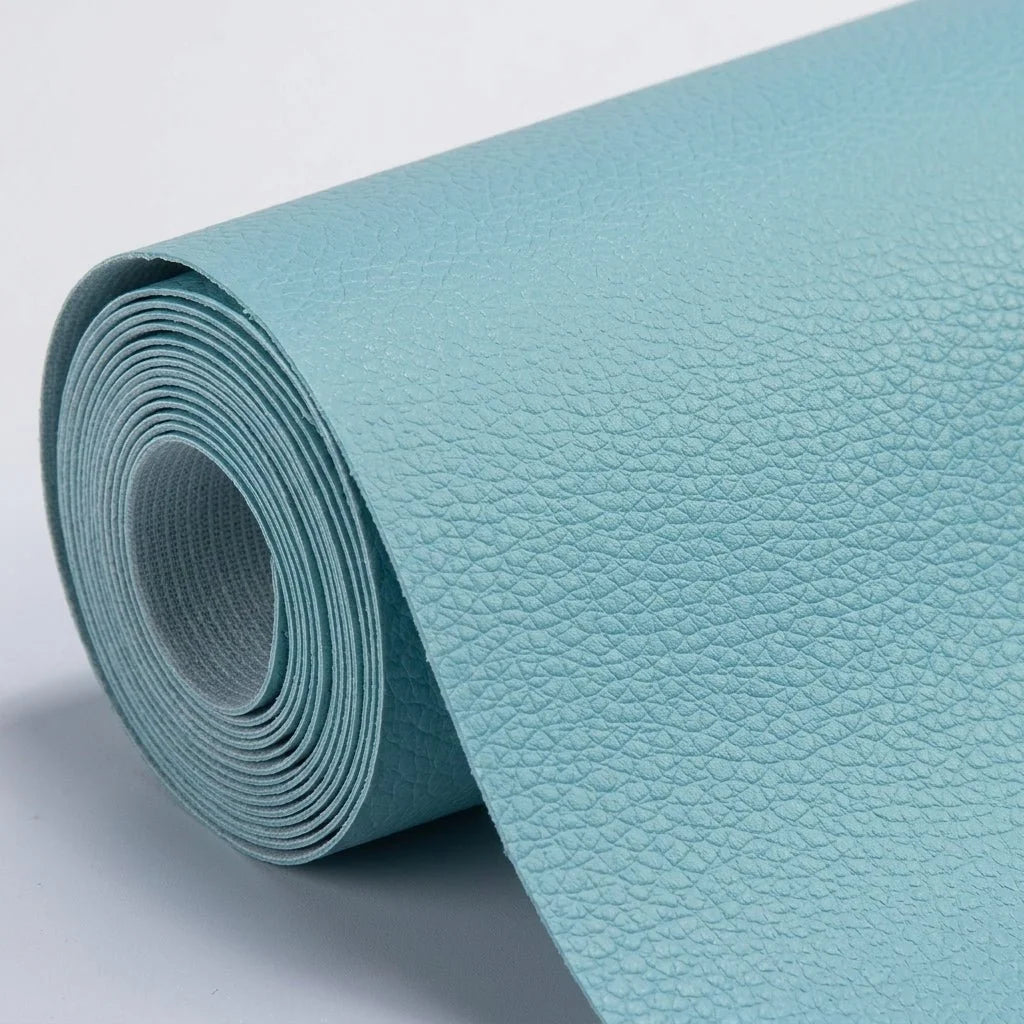 A roll of light blue, textured self-adhesive leather repair patch material on a plain white background.