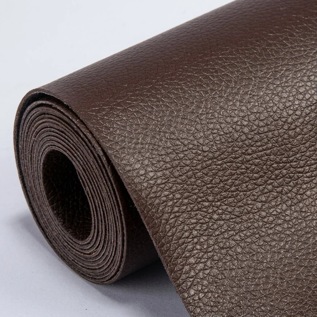 A roll of dark brown, textured self-adhesive leather repair patch material shown against a plain light background.