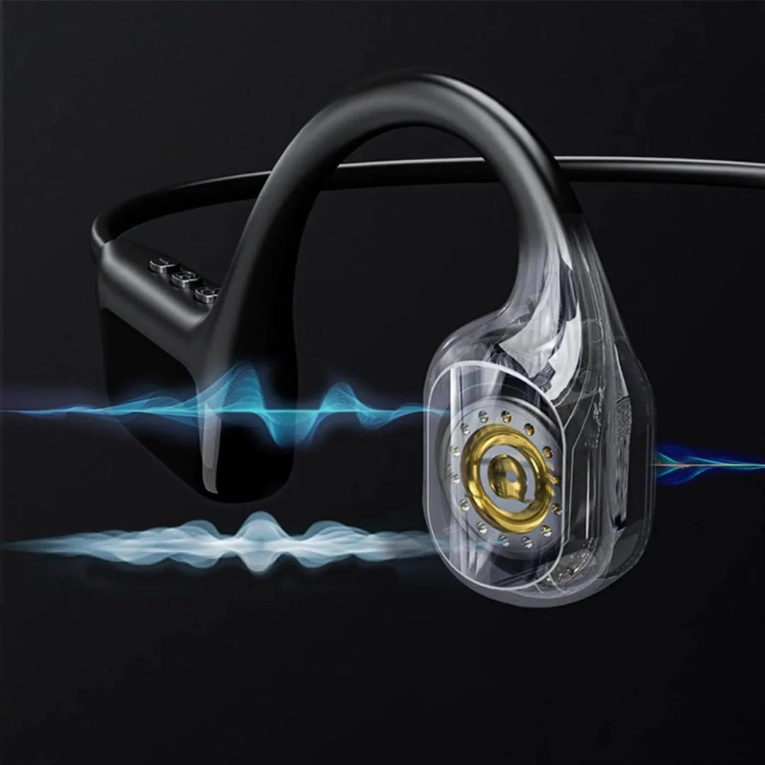 Close-up of a black bone conduction headphone with a transparent casing revealing internal gold-coloured audio components.