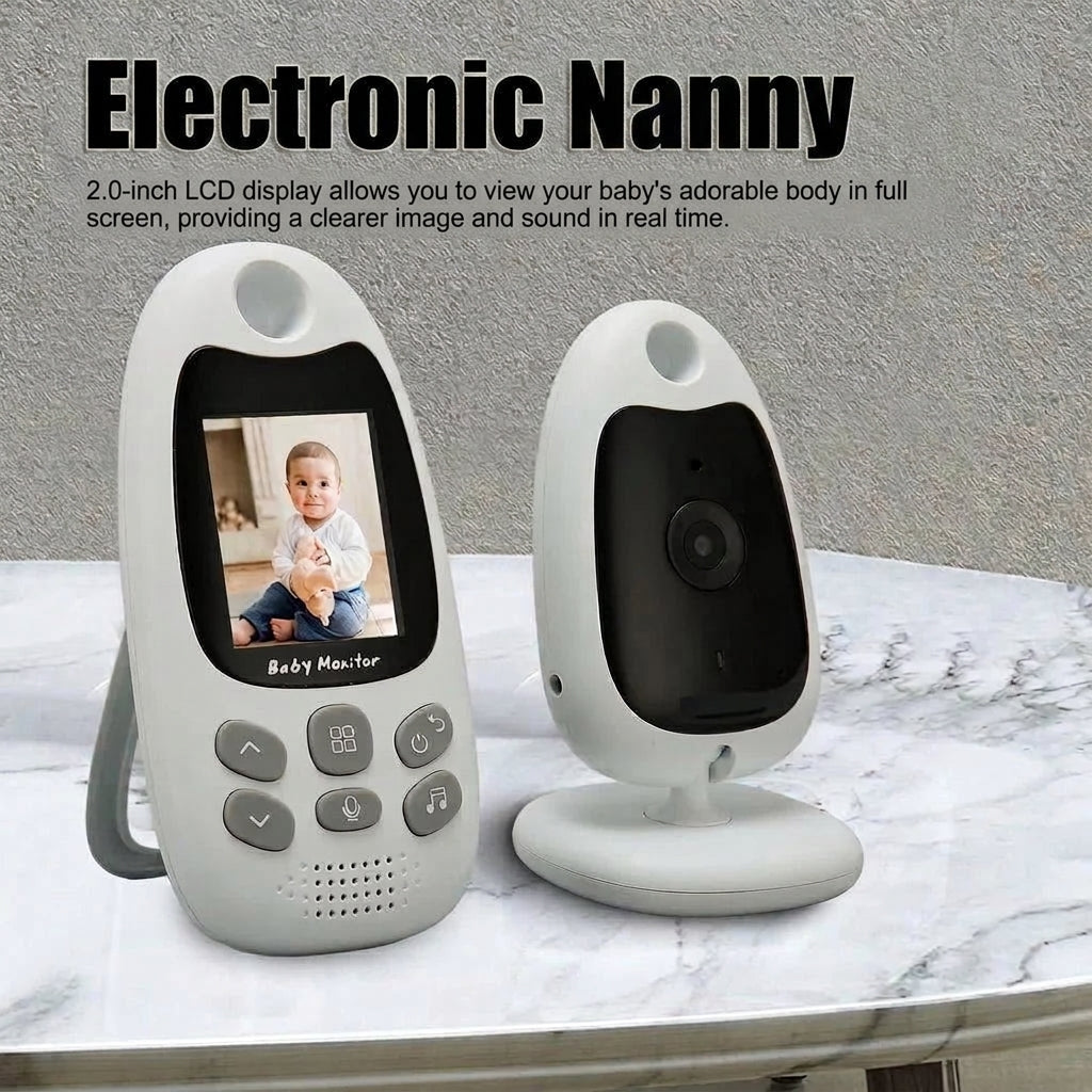A white baby monitor set with a handheld screen displaying a baby and a separate camera unit on a marble surface.