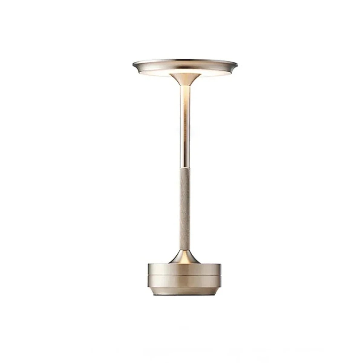 A sleek, cordless table lamp with a metallic finish, featuring a slim stem and a wide, circular light disc at the top.