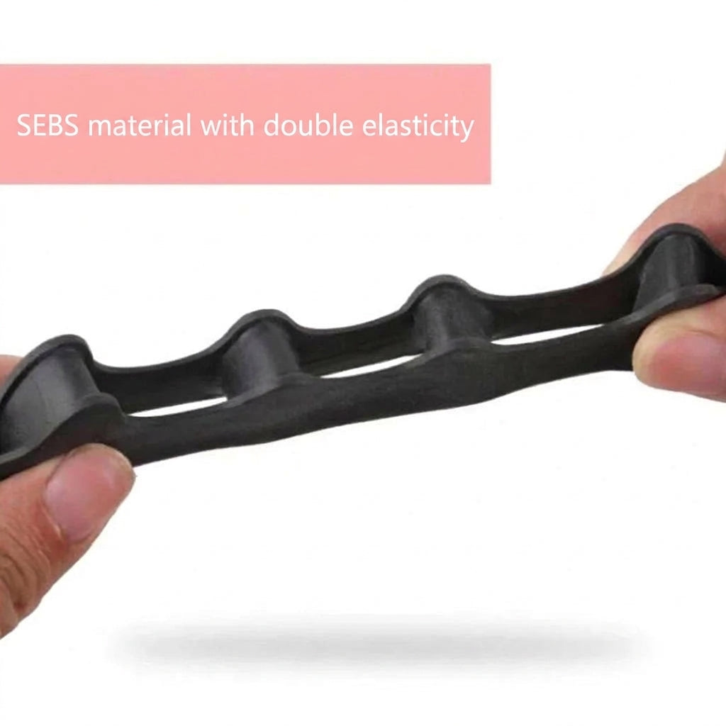 A pair of hands stretching a flexible black silicone bunion corrector made of SEBS material with double elasticity.