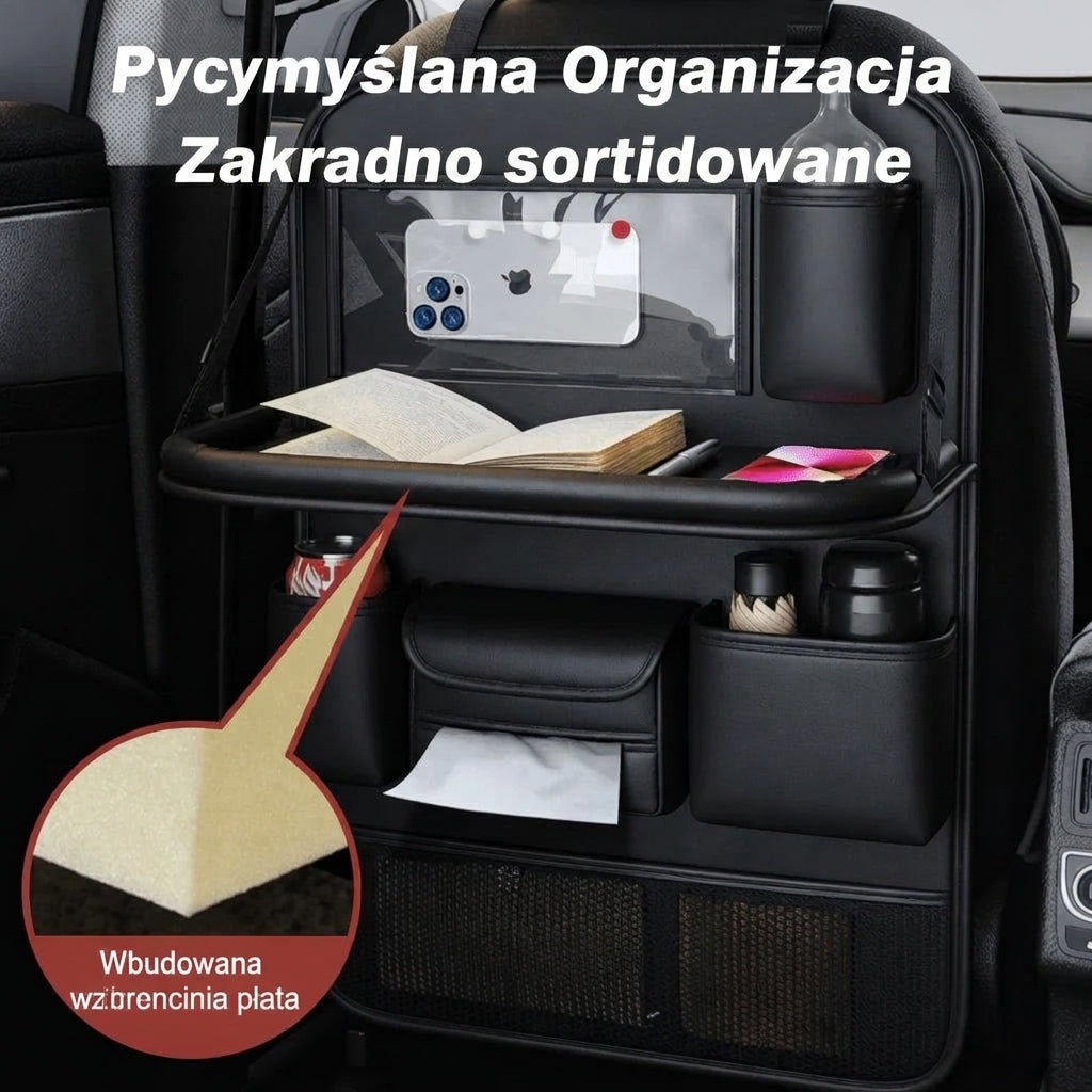 A black leather car seat organiser featuring a foldable tray, tablet holder, tissue box, and storage pockets.