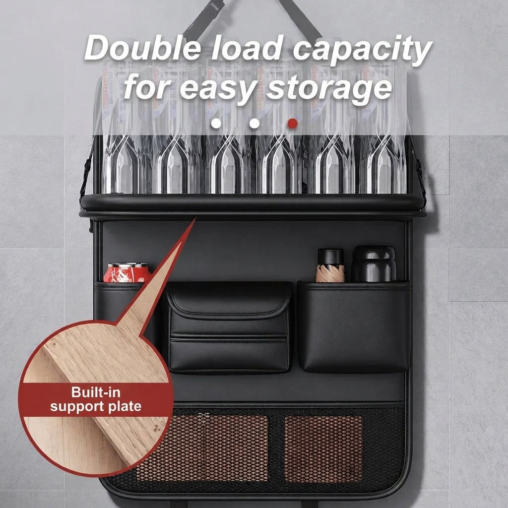 A black car seat organiser featuring a sturdy, reinforced foldable tray and multiple storage pockets for convenient travel.
