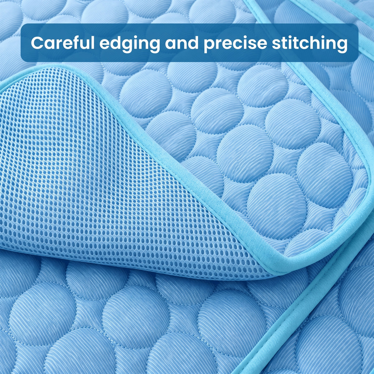 Close-up of a blue cooling mat for dogs, highlighting the neat stitching and durable mesh fabric texture.