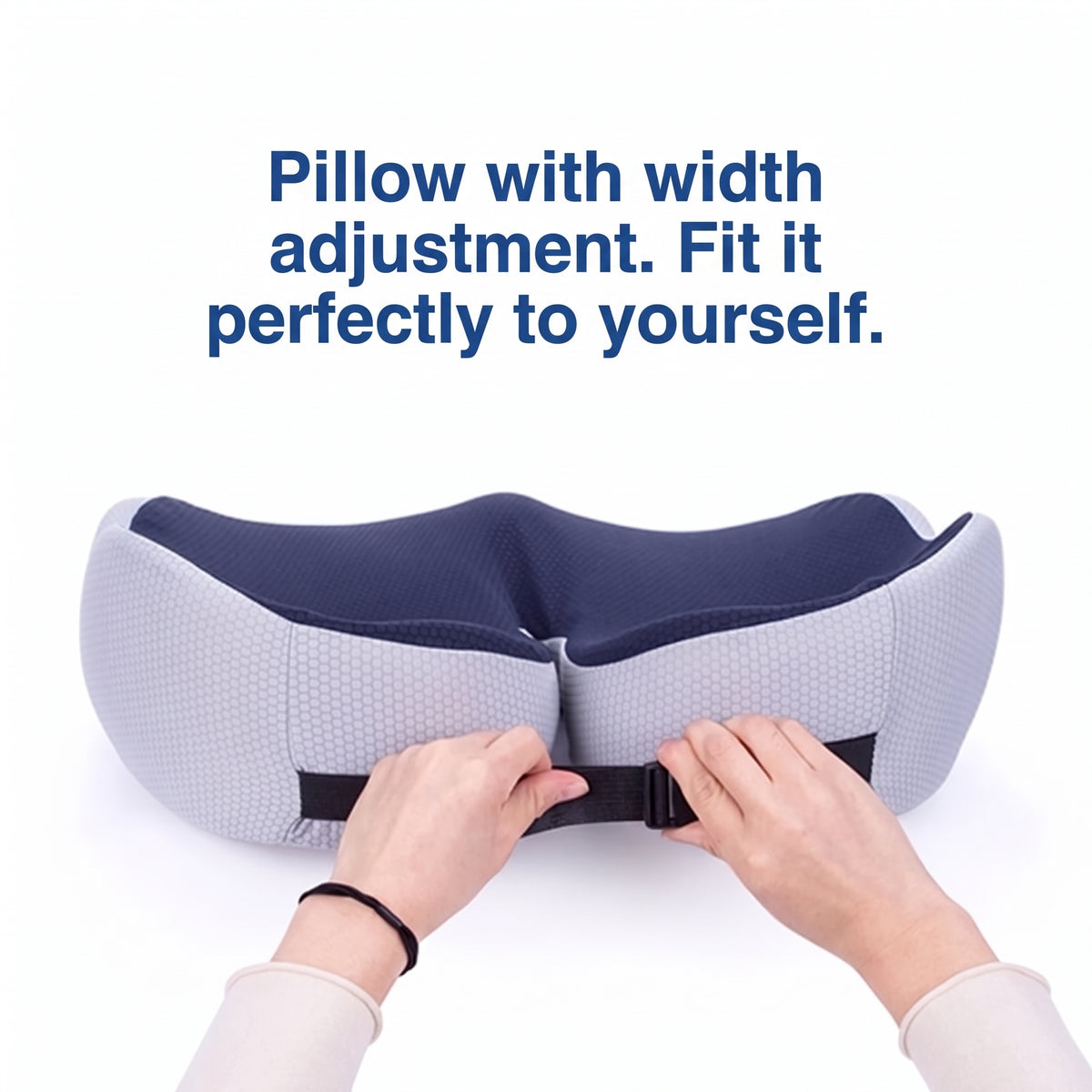 Hands adjusting the strap on a grey and navy memory foam chair cushion to customise the width for a perfect fit.