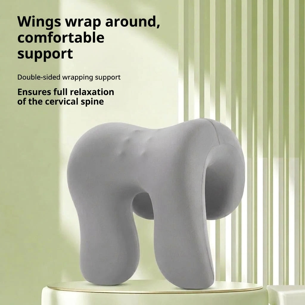 A grey ergonomic memory foam neck support pillow with massage points, designed to cradle the neck for relaxation.